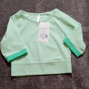 Fabletics NWT Avah Color Block Cut off Sleeve Crop Aloe and Tropical Water